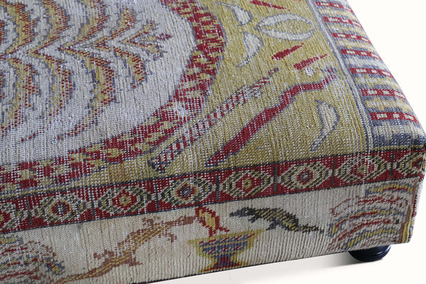 Upholstered Ottoman in an Antique 19th Century Khotan Rug