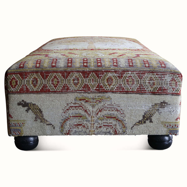 Upholstered Ottoman in an Antique 19th Century Khotan Rug